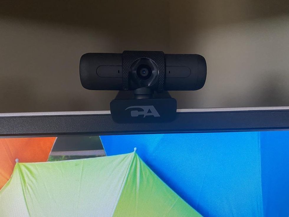 a photo of Cyber Acoustics CA Essential Super HD Webcam on a computer monitor
