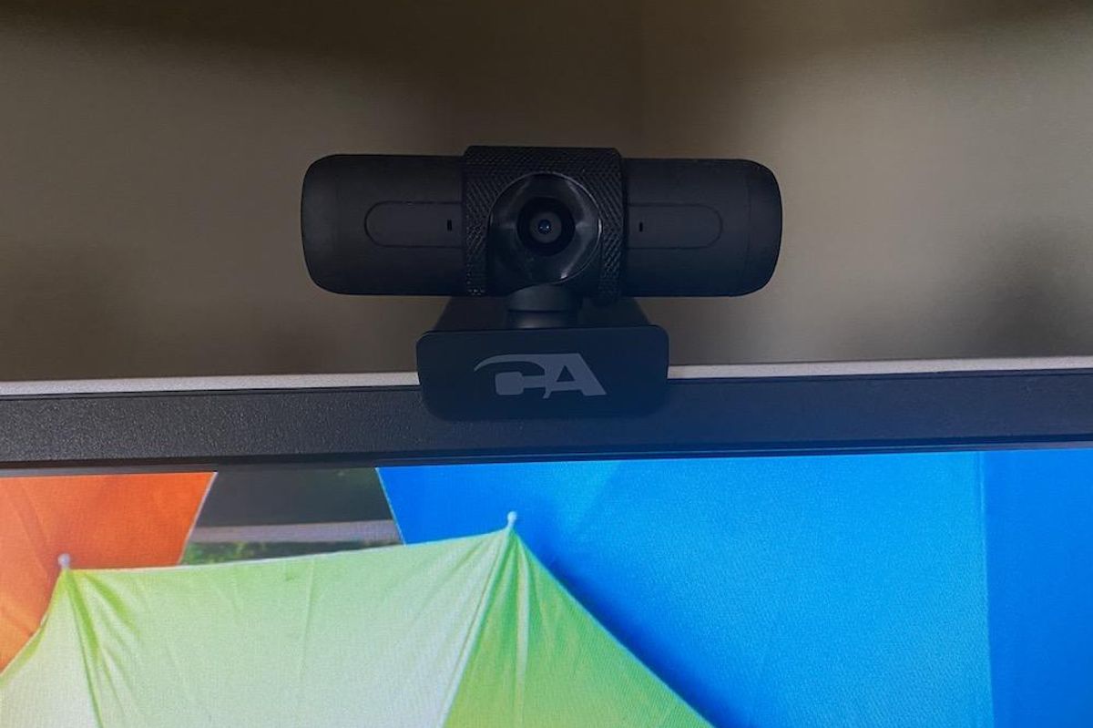 a photo of Cyber Acoustics CA Essential Super HD Webcam on a computer monitor