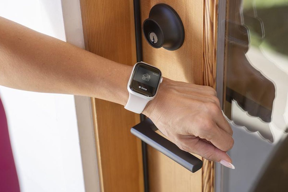 a photo of a Apple Watch unlocking Level Lock+ smart lock