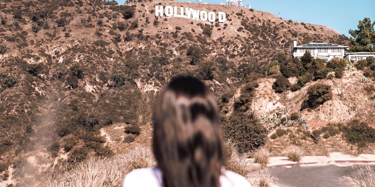 Woman gazing at the Hollywood sign