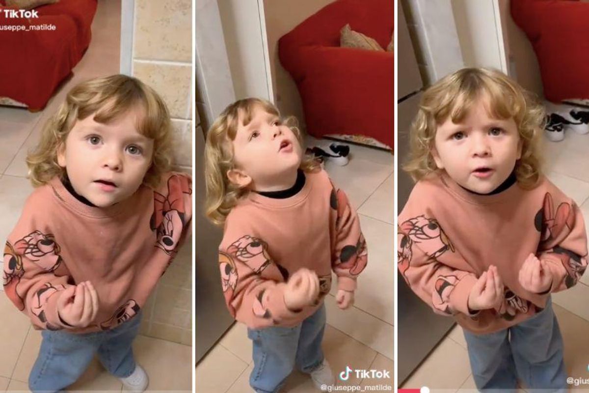 preschooler in pink sweater and jeans