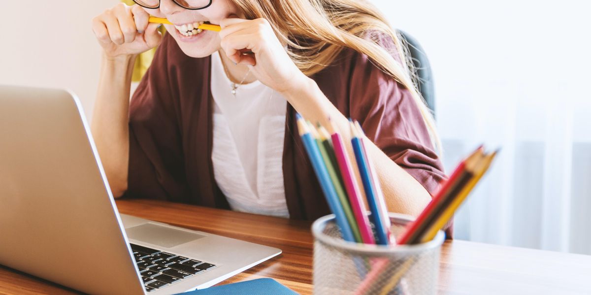 Angry woman at computer.