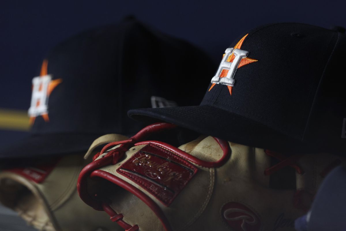 Astros hat glove