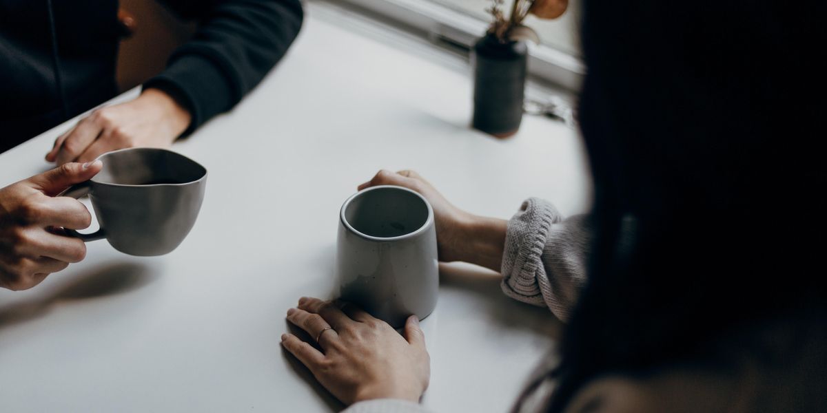 Two People Having Coffee