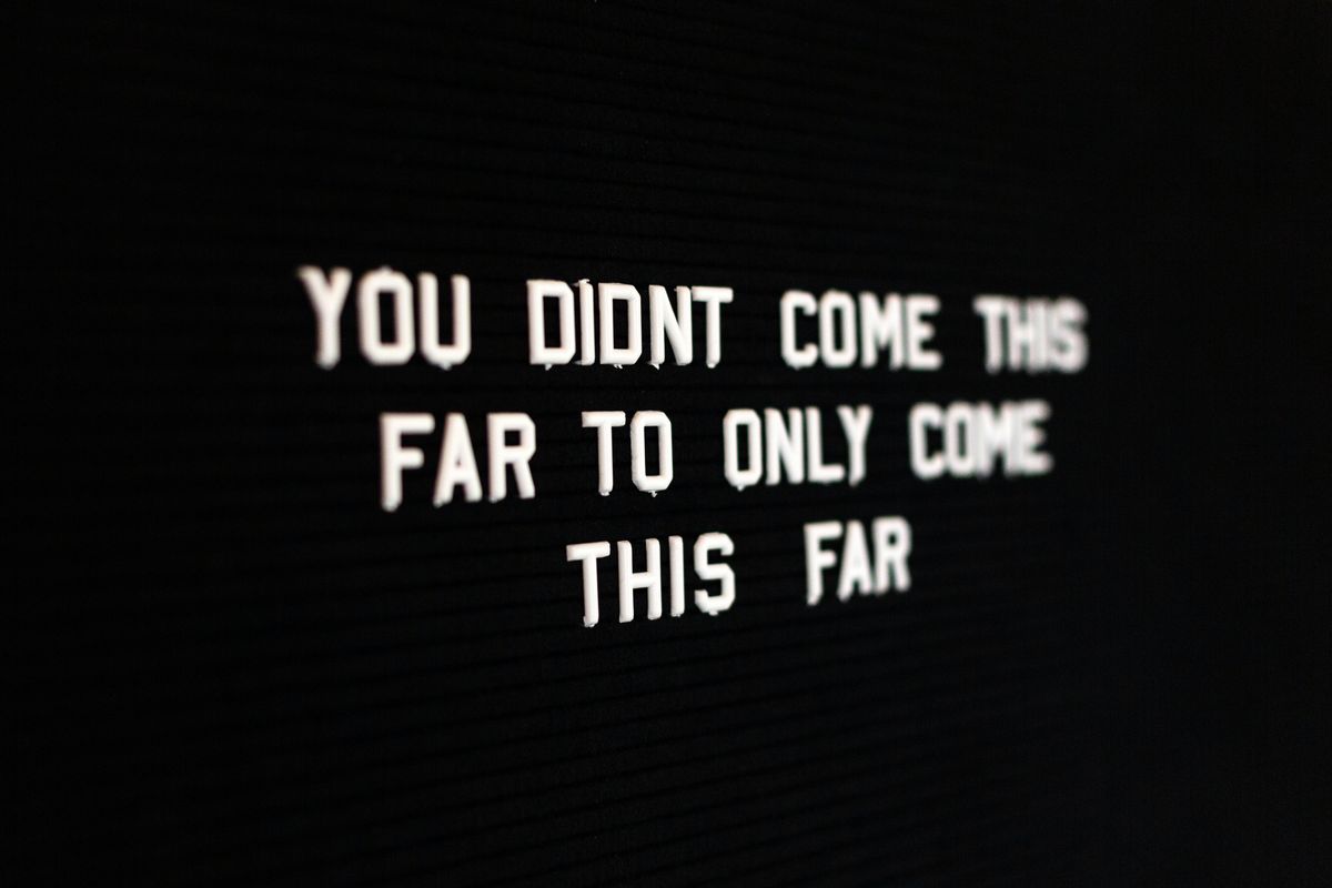 White letter with black background that read " you didn't come this far to only come this far"
