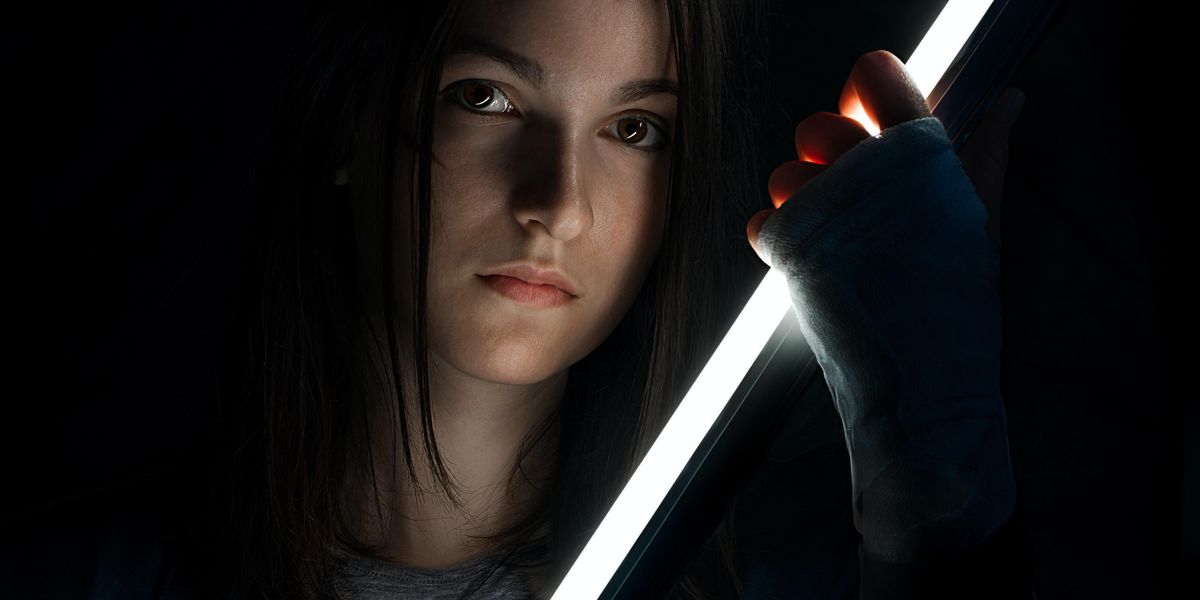 a woman holding a sword