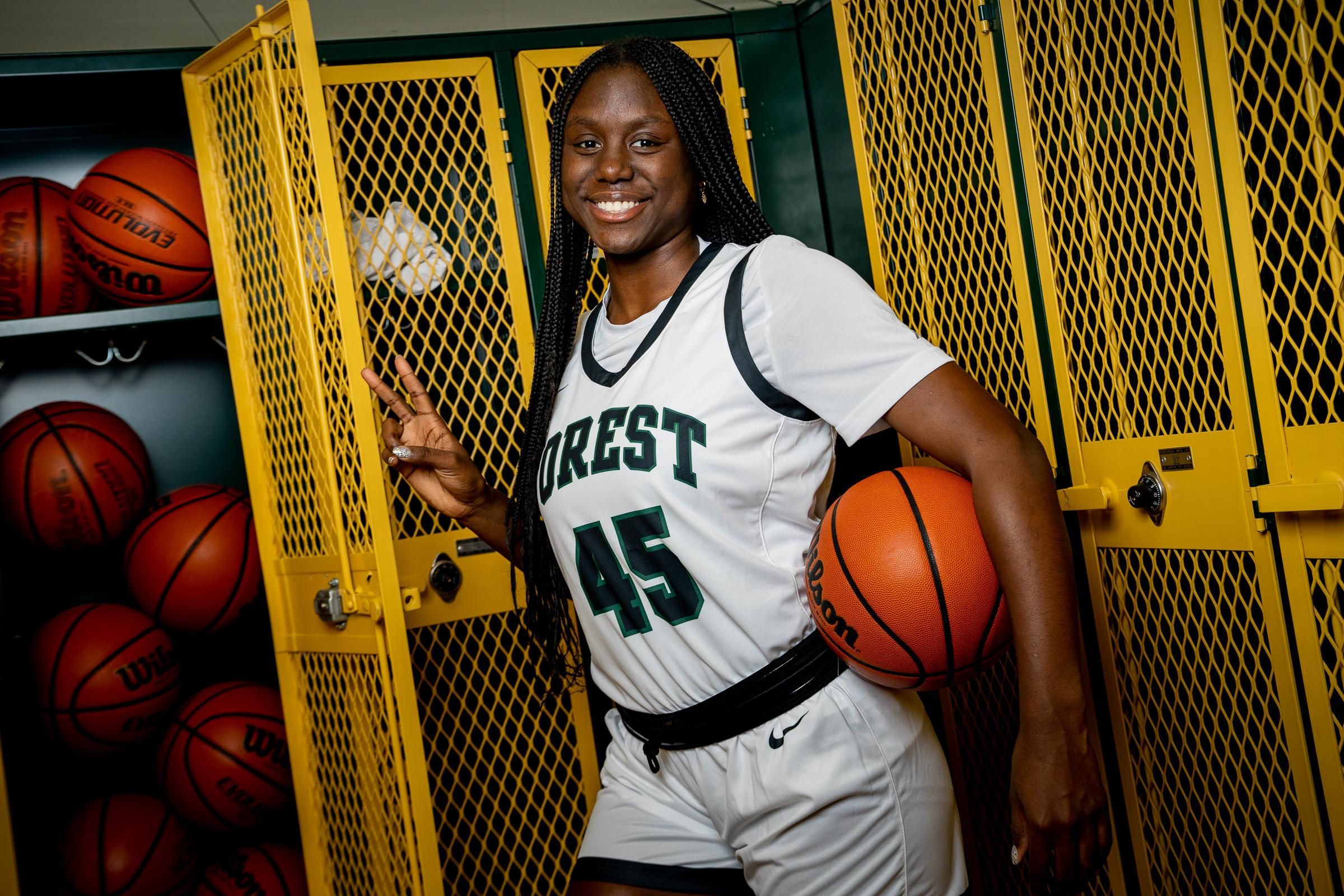 COMING OF AGE; Simien making a name for herself in Athletics and Academics