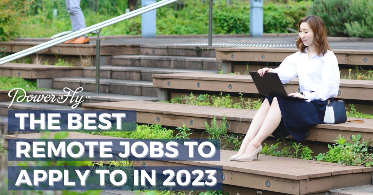 White PowerToFly Logo and text that reads "The Best Remote Jobs to Apply To in 2023" with a woman working remotely outside