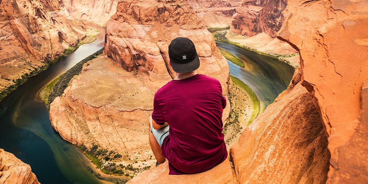 Man overlooking a canyon