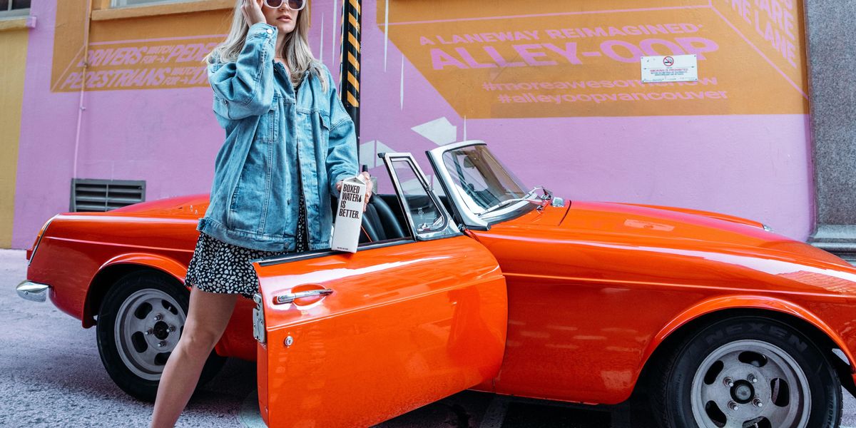 Rich woman with expensive car