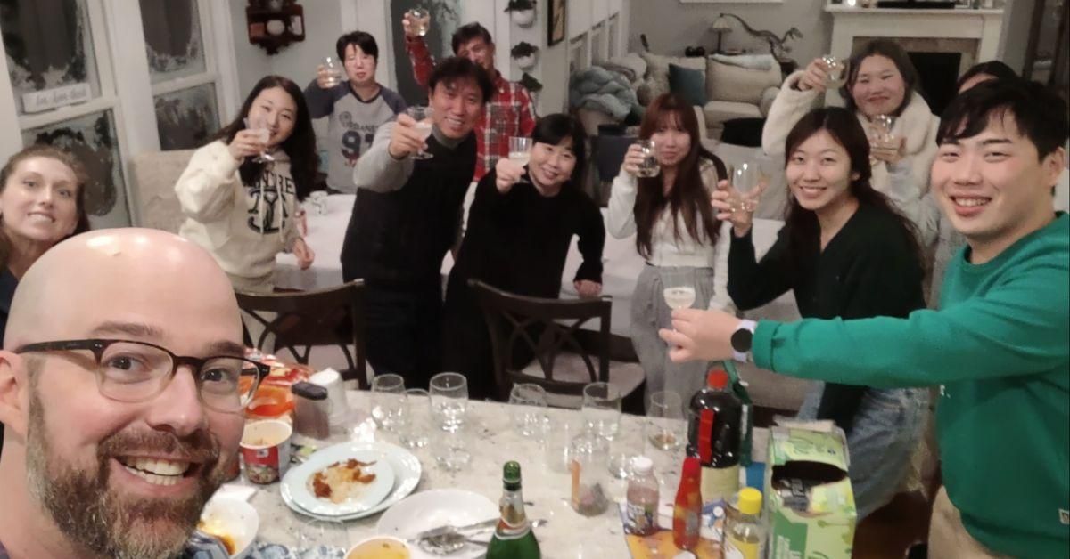 Alexander Campagna's Facebook photo with the stranded South Korean tourists in his home