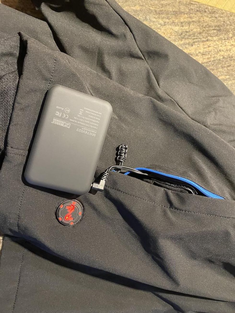 a photo of 7v battery connected to jacket