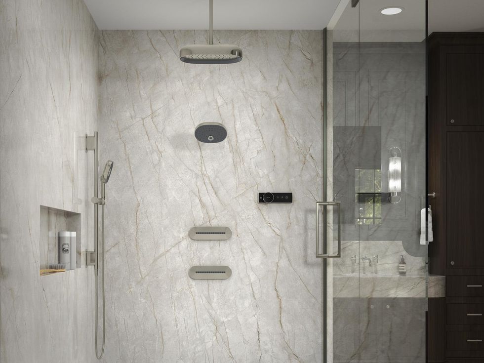 A photo of a shower with Kohler Statement Collection of smart faucets and heads