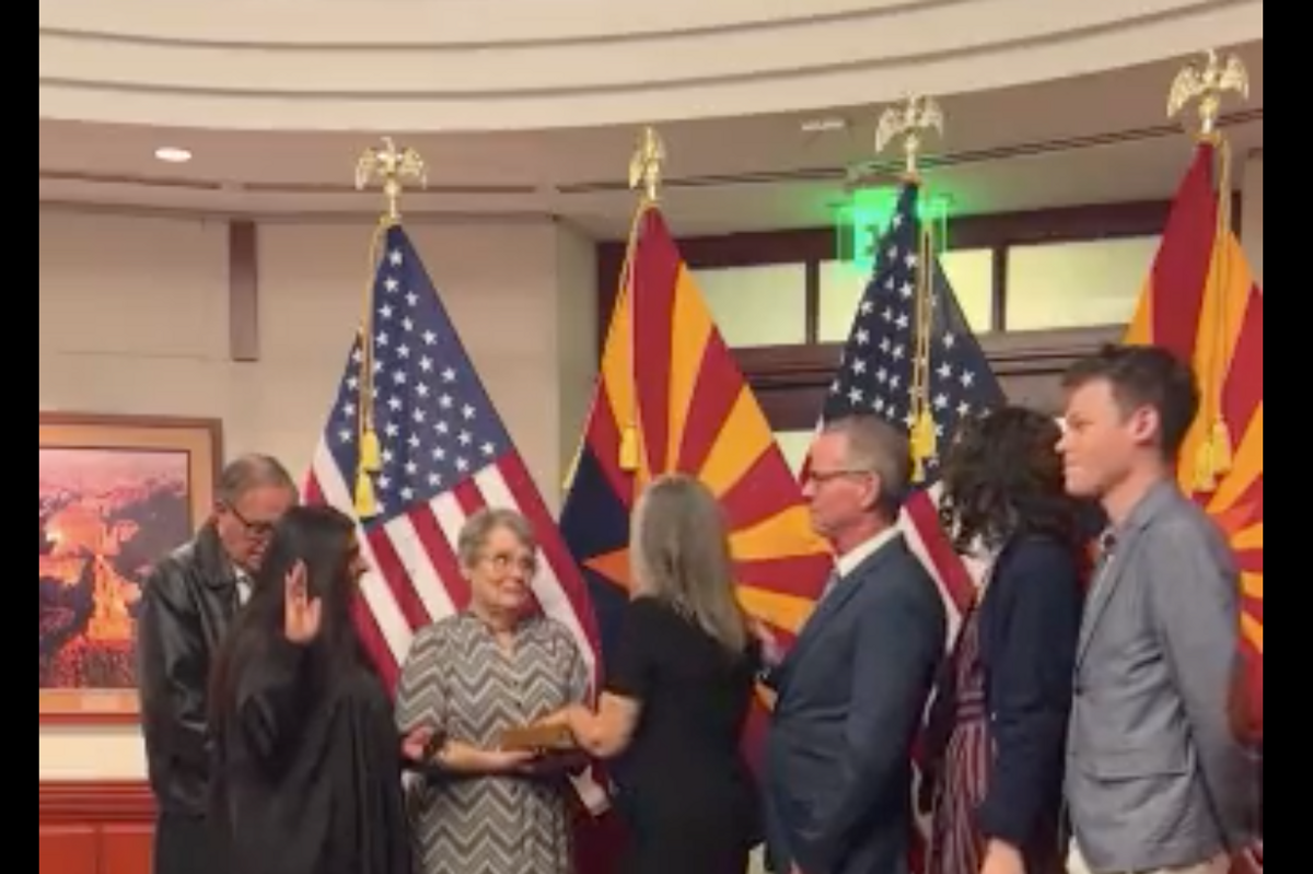 AZ Gov. Katie Hobbs Laughs During Swearing-In. That's An Impeachin'!