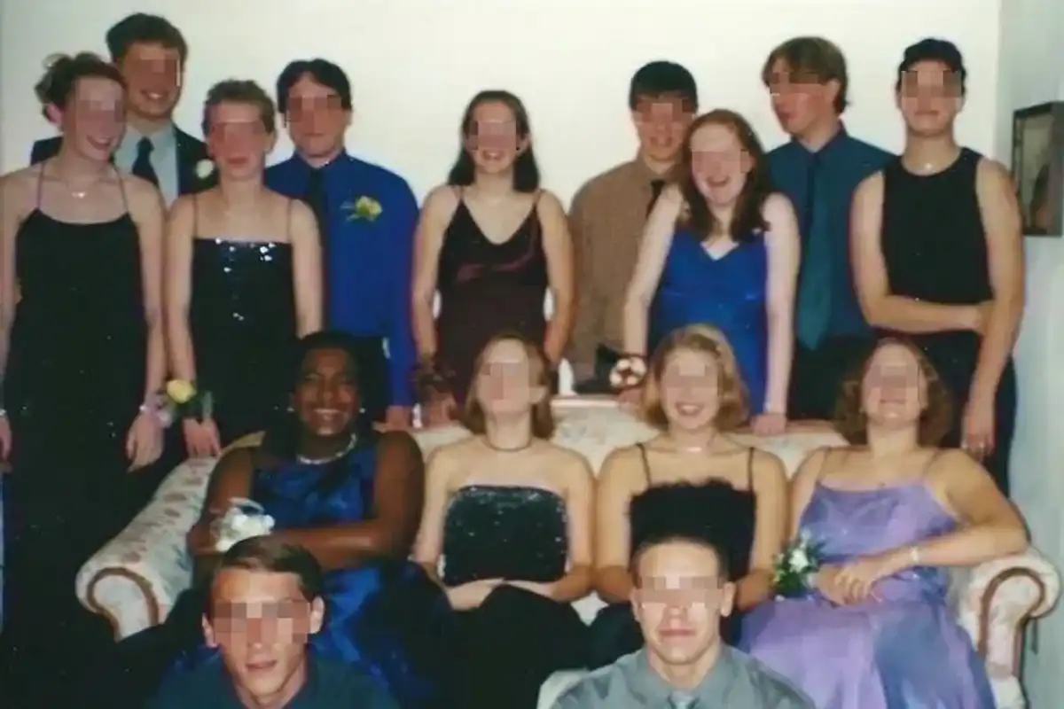 group of teens taking a photo before a dance. all eyes are pixelated except the author's