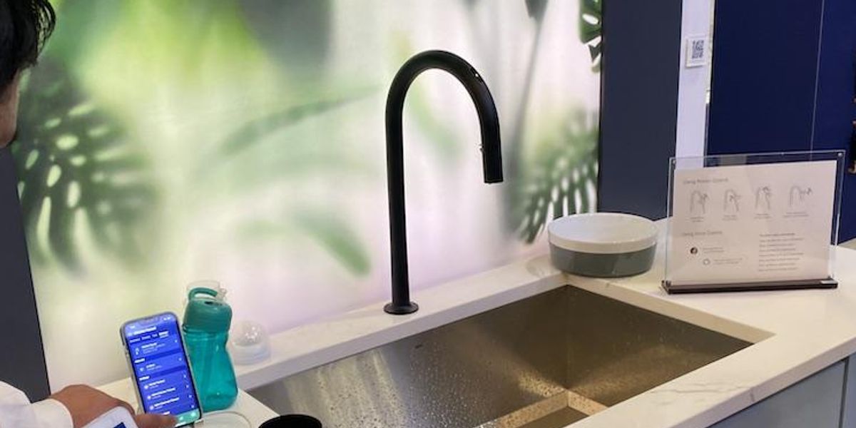 a photo of Moen's Handle-free Smart Faucet with Motion Control at CES Show