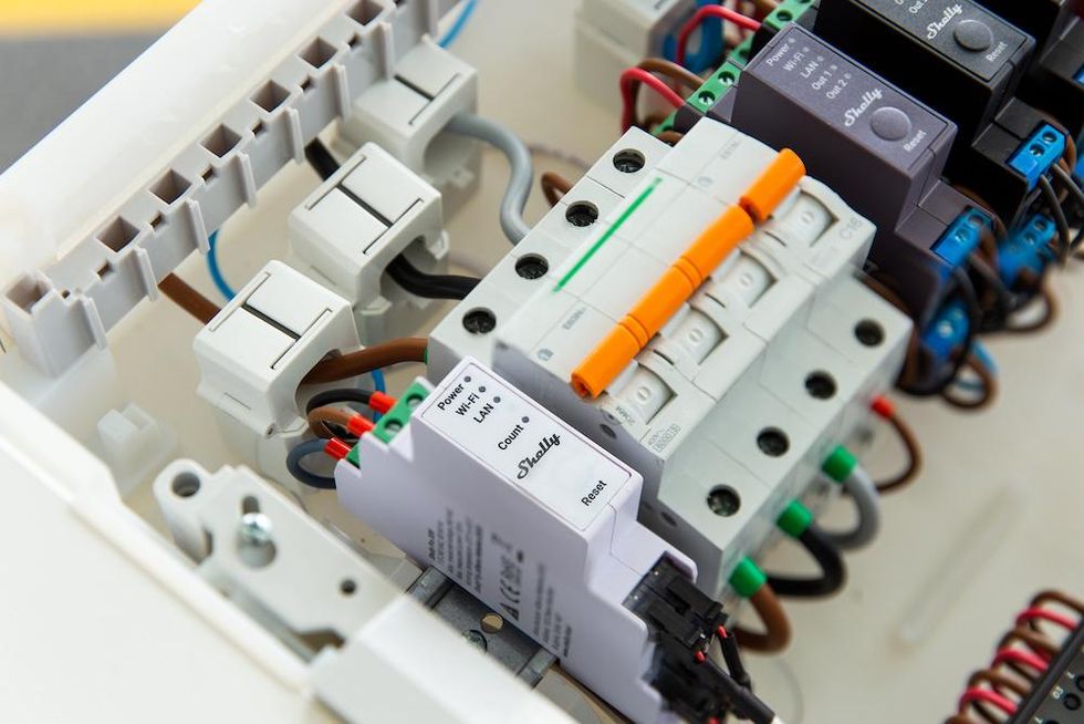 a photo of Shelly Pro 3EM in a panel