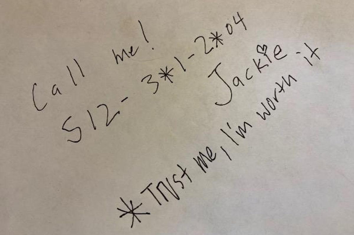 a handwritten note of a woman's number that says, 'Call me!'