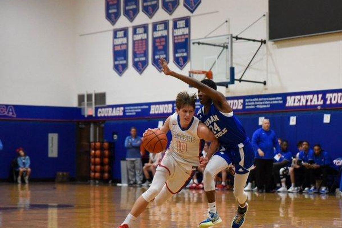 HIGHLIGHT VIDEO: Trinity Christian Trojans defeat Nolan Catholic boys hoops