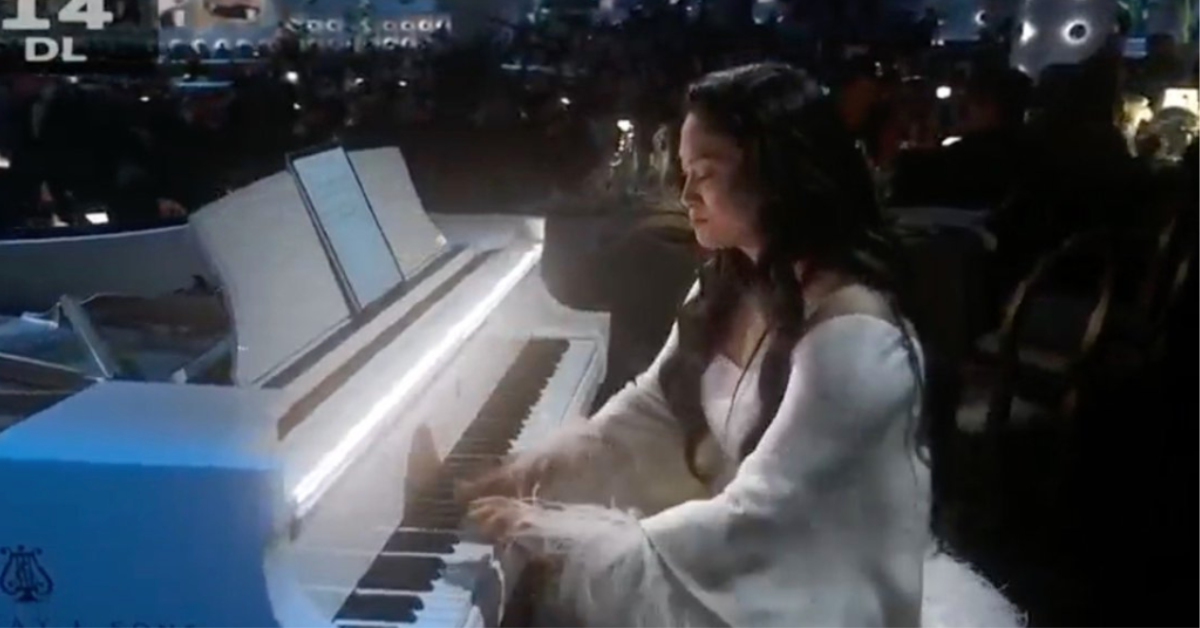 Chloe Flower playing piano