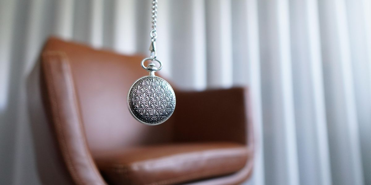Round silver pendant used for hypnotism