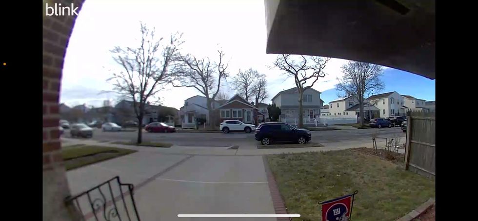a screeshot of live vide from Blink Video Doorbell shows a wide view 
