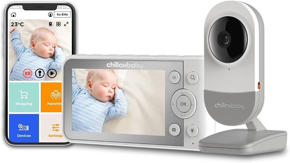 a photo of Chillax Daily Baby monitor, display and mobile app on a smartphone