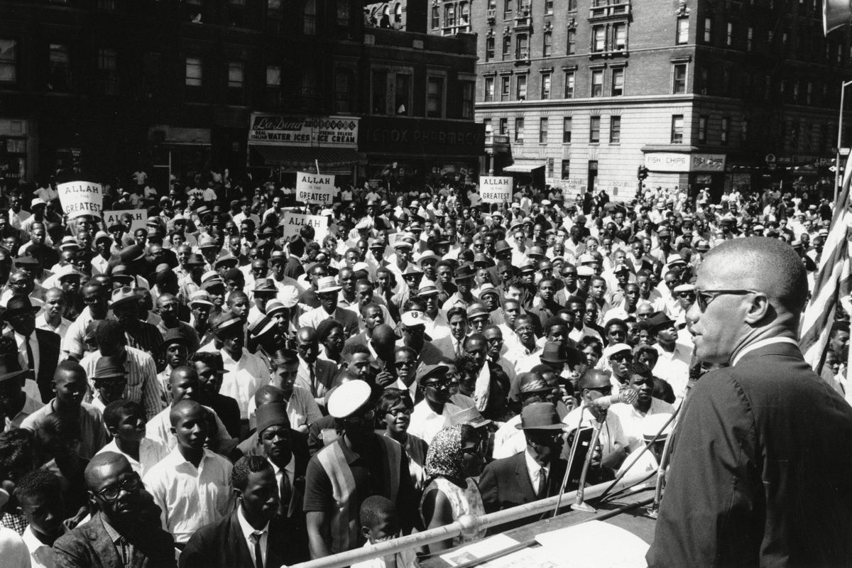 Malcolm X, Black Muslim leader, addresses a rally in Harlem in New York City