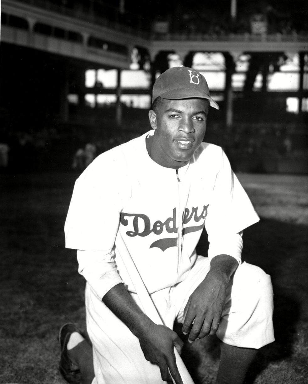 Robinson Jackie Robinson of the Brooklyn Dodgers poses at Ebbets Field in the Brooklyn borough of New York. 