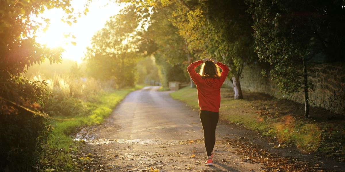 Woman walking down a path