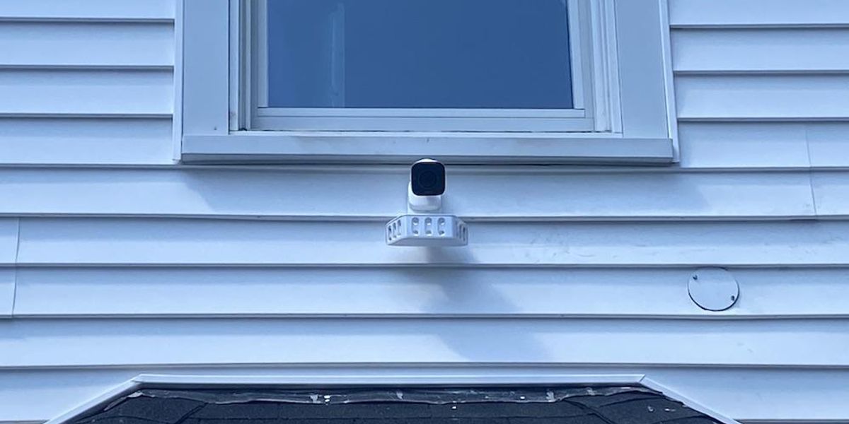 a photo of the Vivint Spotlight Pro installed on the side of a house