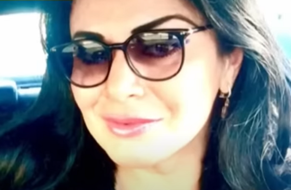 Woman accused of trying to kill doppelganger friend with poisoned cheesecake so she could steal her identity and return to Russia where she is wanted for murder of another woman