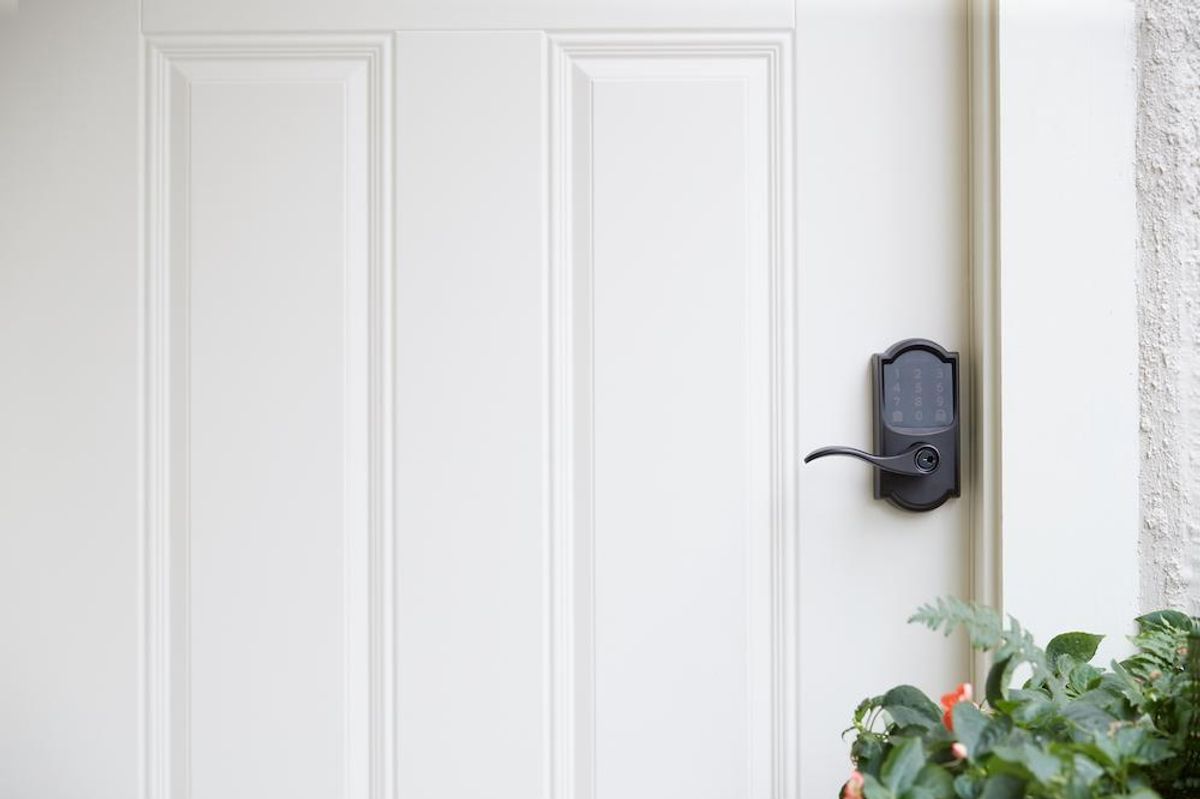 a photo of a front door with Schlage Encode Smart Wi-Fi Lever Lock