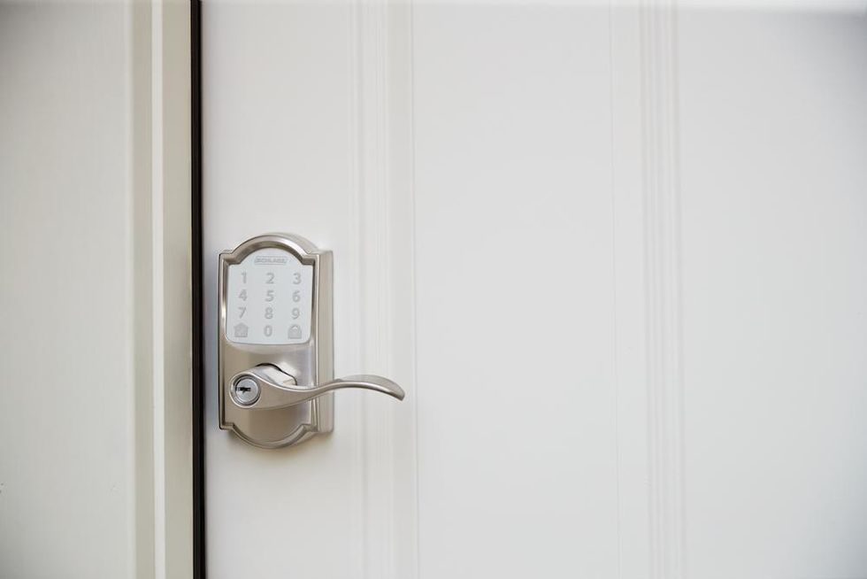 a photo of Encode Smart Wi-Fi Lever lock on a front door