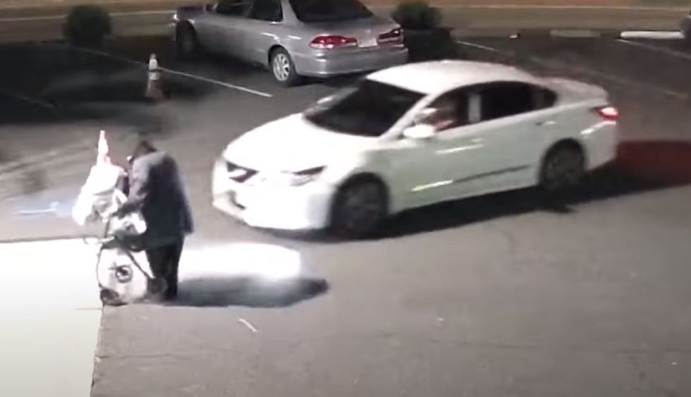 Video shows driver intentionally ramming his car into elderly homeless woman in parking lot of California church Video shows driver intentionally ramming his car into elderly homeless woman in parking lot of California church