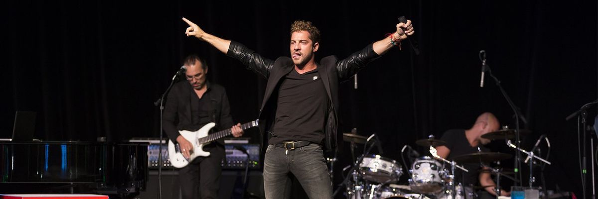 Spanish singer David Bisbal at the 2014 Latin Grammys
