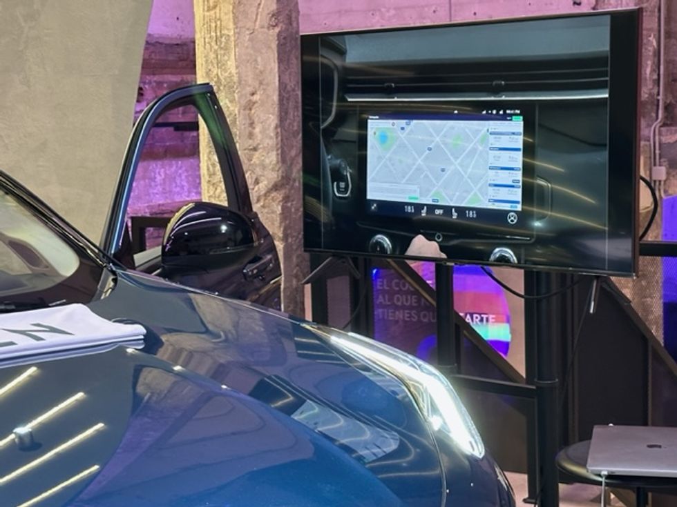 a photo of Aiden Auto demo at MWC 2023