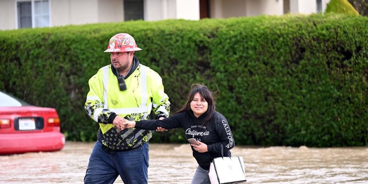 NextImg:California communities brace for more rain amid massive flooding, levee break, rescues, evacuations