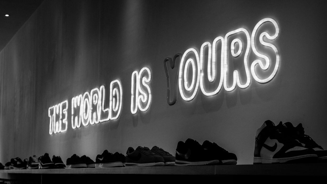 Neon Sign that reads "The World Is Yours" with the "Y" not illuminated