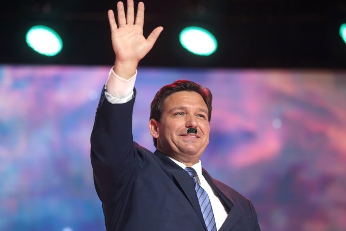 Ron DeSantis Takes Break From Punching Queer Kids, Gives Immigrant Kids Their Turn