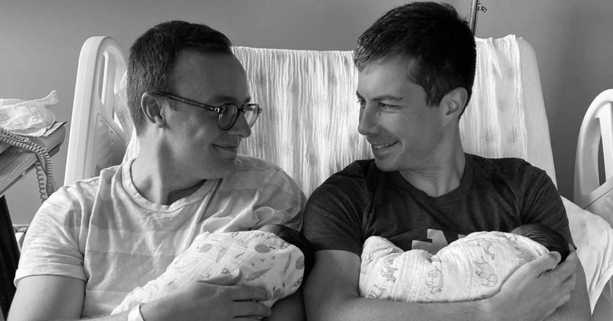 Pete and Chasten Buttigieg holding their twin babies