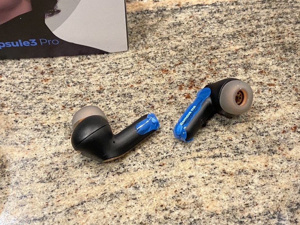 A photo of Soundpeats Capsule3 Pro Earbuds on a countertop
