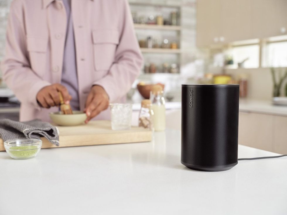 a photo of Sonos Ear 100 smart speaker in a kitchen