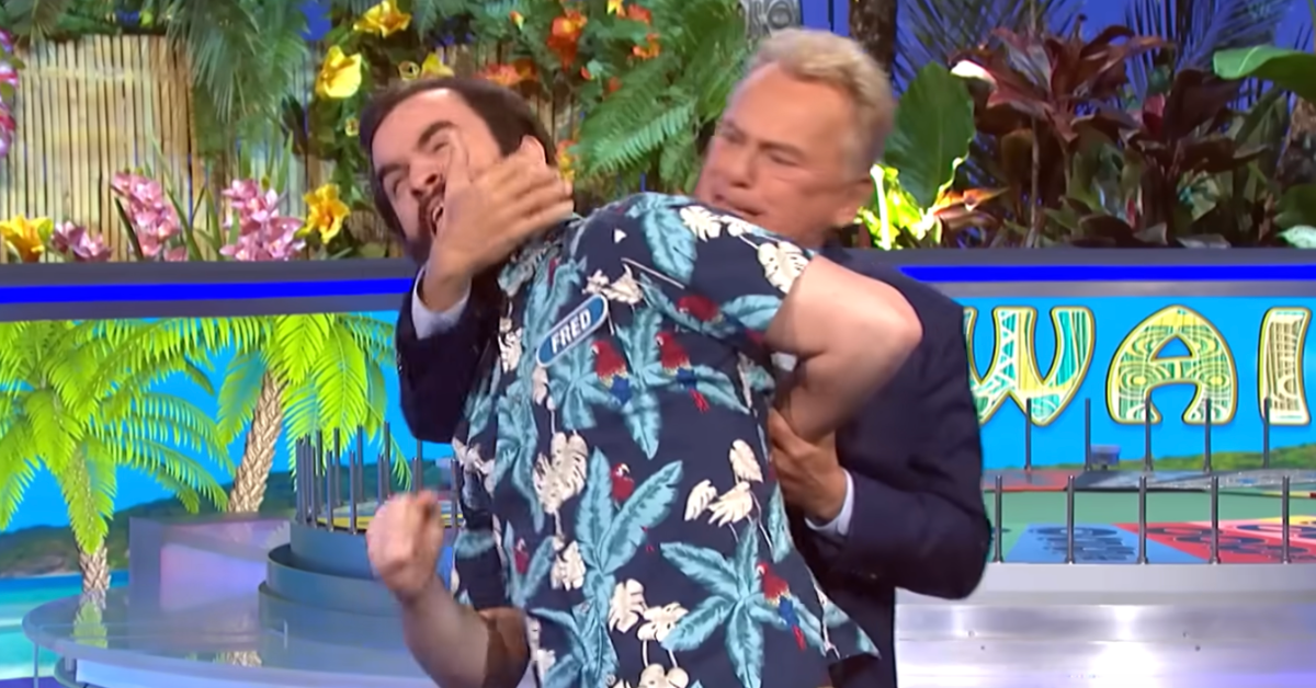 Pat Sajak 'Wrestles' With A Winning 'Wheel Of Fortune' Contestant In Hilariously Bizarre Moment