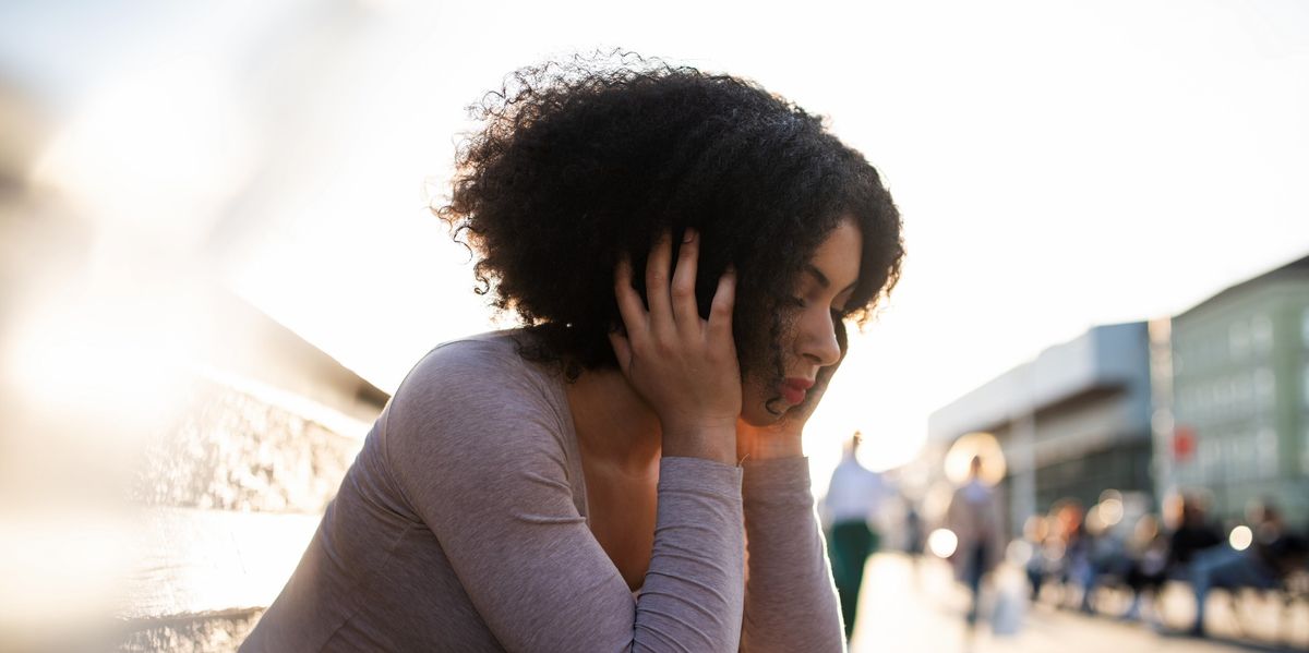 black-woman-sad-looking-defeated-feeling-stuck-liminal-spaces