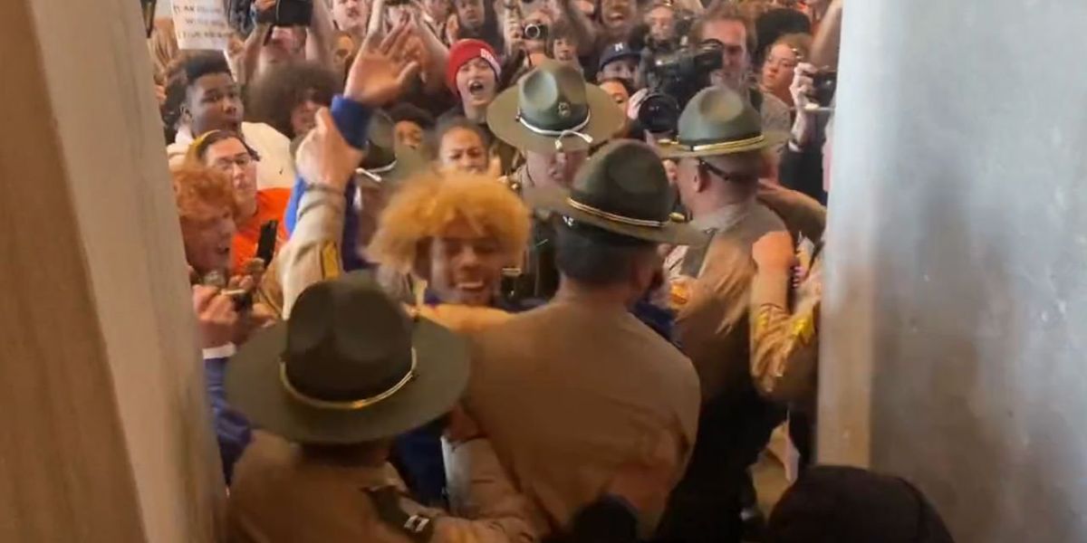 NextImg:Anti-gun protesters storm Tennessee state Capitol, attempt to shove past troopers — media claims, 'This was a peaceful protest'