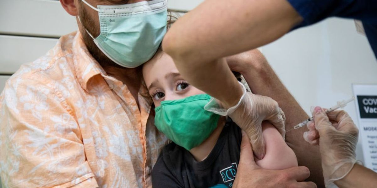 NextImg:World Health Organization 'urges' countries to reconsider giving healthy kids and teens COVID-19 shots