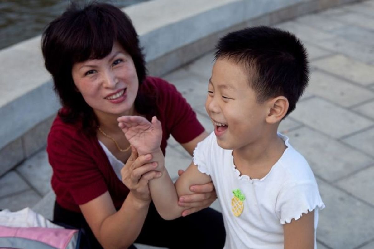 Korean mother and child smiling