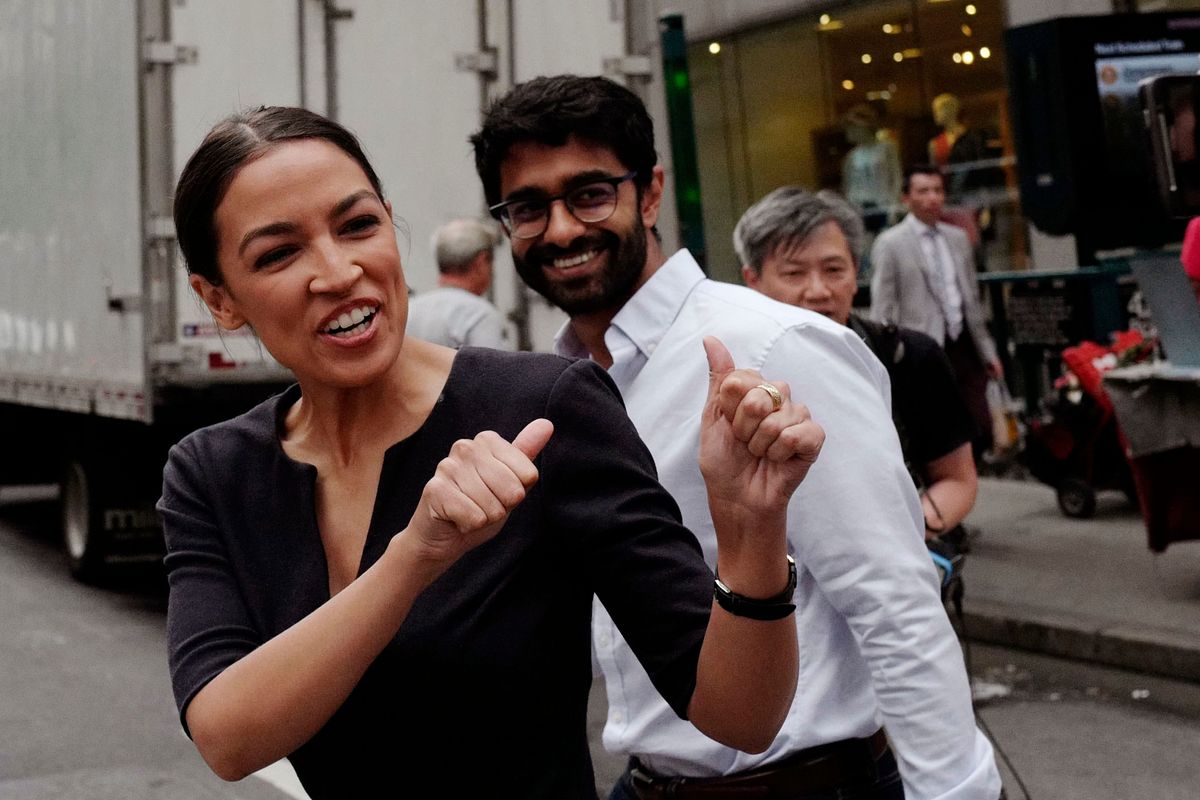 Alexandria Ocasio-Cortez, Saikat Chakrabarti. Alexandria Ocasio-Cortez, left, the winner of New York's Democratic Congressional primary, greets supporters following her victory
