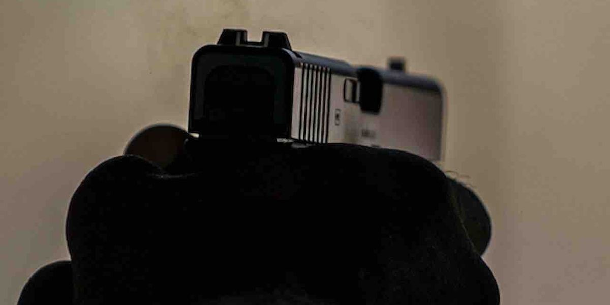 NextImg:Concealed carrier shoots armed robber who's holding his friend at gunpoint and threatening to kill him